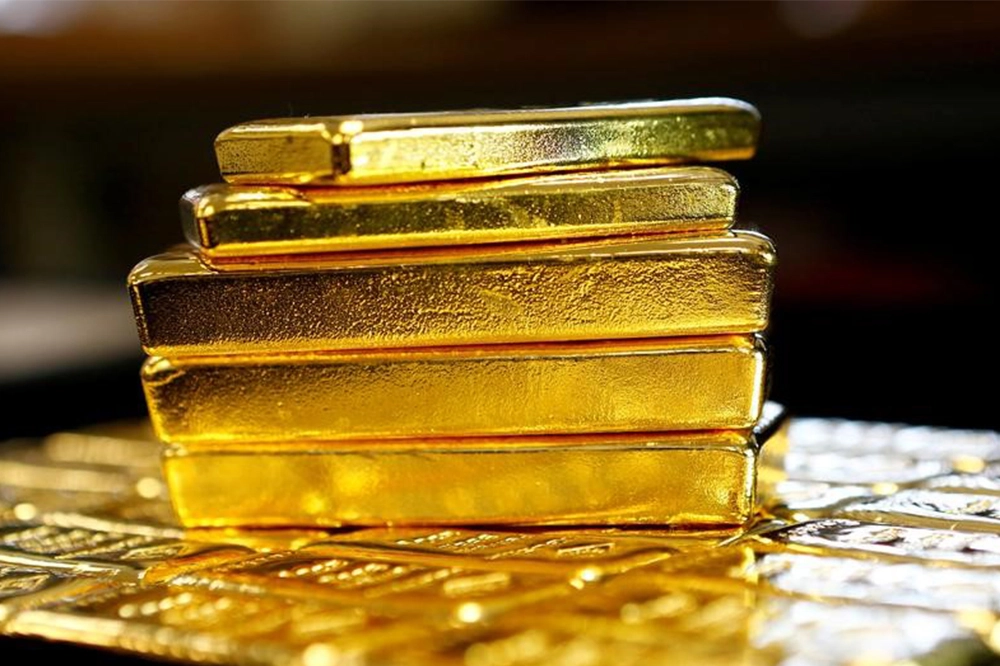 الذهب يتراجع مع تحسن الشهية للمخاطرة والنحاس يصل إلى أعلى مستوى في 5 أسابيع